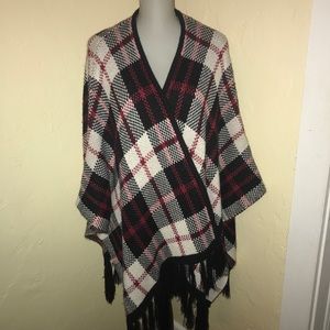Super fun, cozy, fringed plaid poncho
